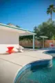 exterior backyard view of pool in 1946 Albert Frey designed Palm Springs home