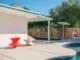 exterior backyard view of pool in 1946 Albert Frey designed Palm Springs home